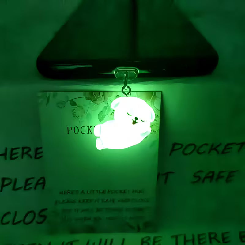 The Glow Puppy Phone Charm — close-up detail