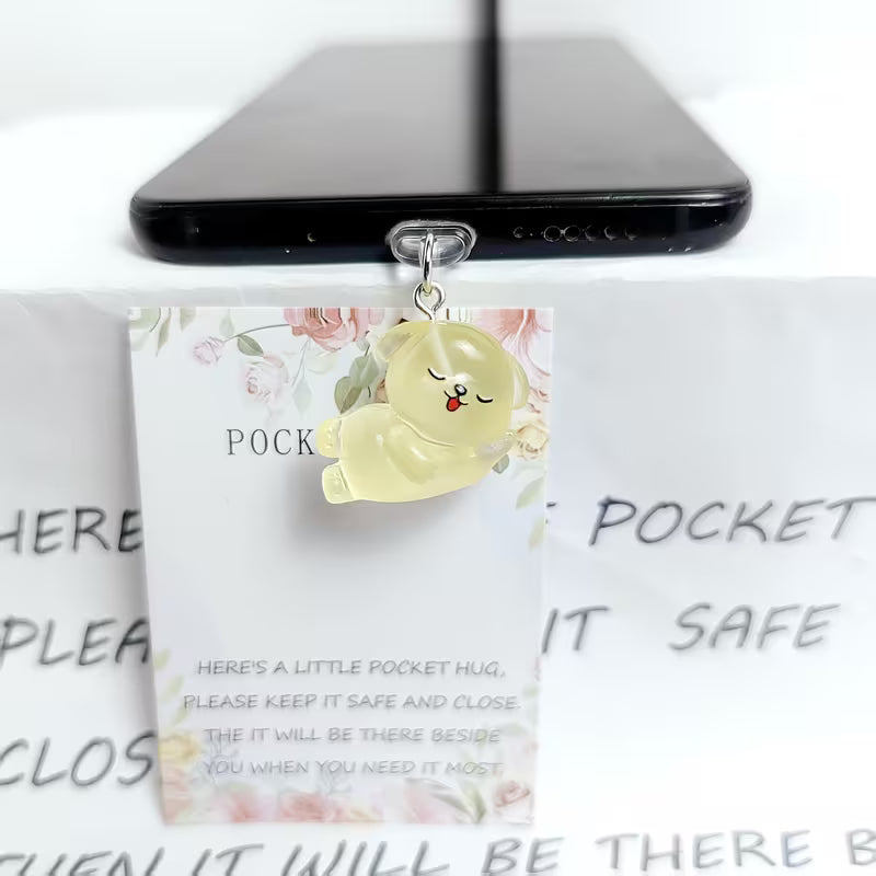 The Glow Puppy Phone Charm — styled product view