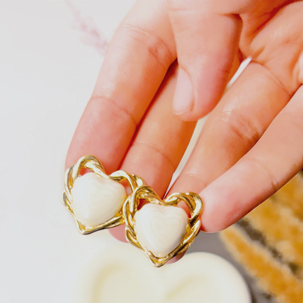 The Ivory Edit Earring Set — heart pair detail