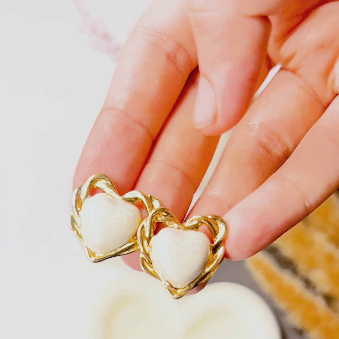The Ivory Edit Earring Set — heart pair detail